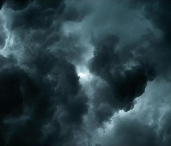 dark storm clouds forming in sky